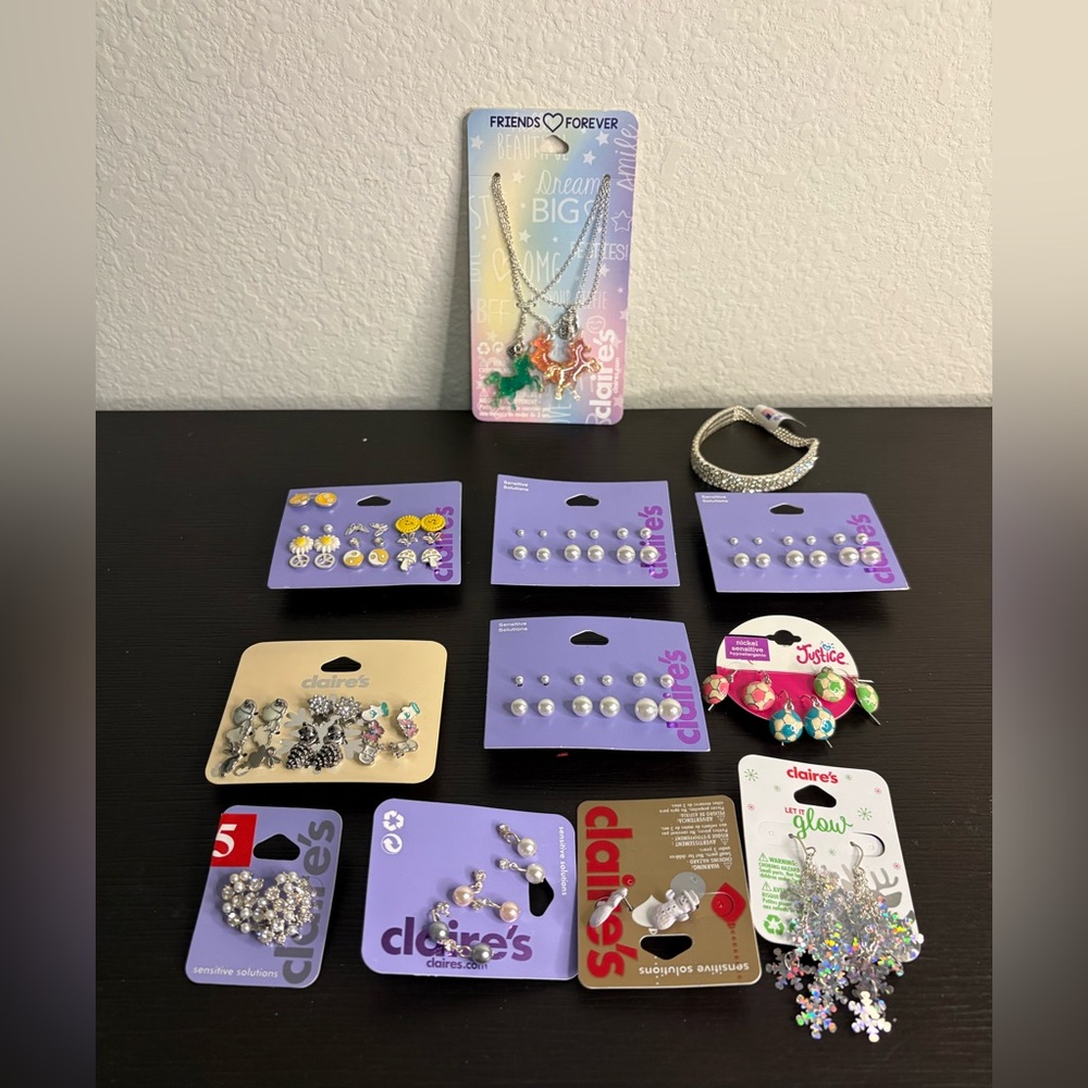 Lot of 12 Claire’s costume jewelry. Includes earrings, necklace and bracelet New